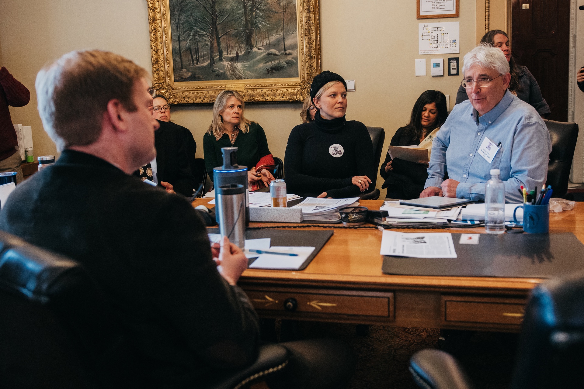 VBSR members engaged in a roundtable policy discussion at the Vermont State House.
